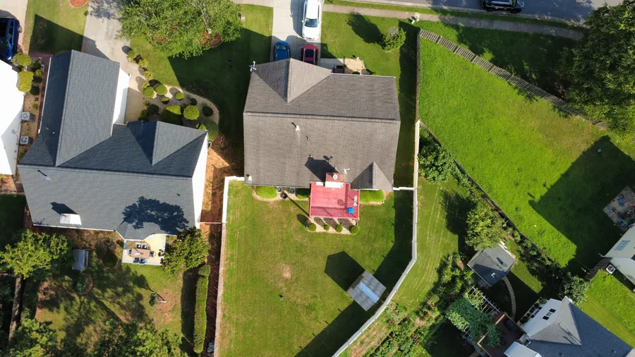 Aerial view of Cincinnati suburban neighborhood showing homes, cul-de-sac streets, and mature tree canopy