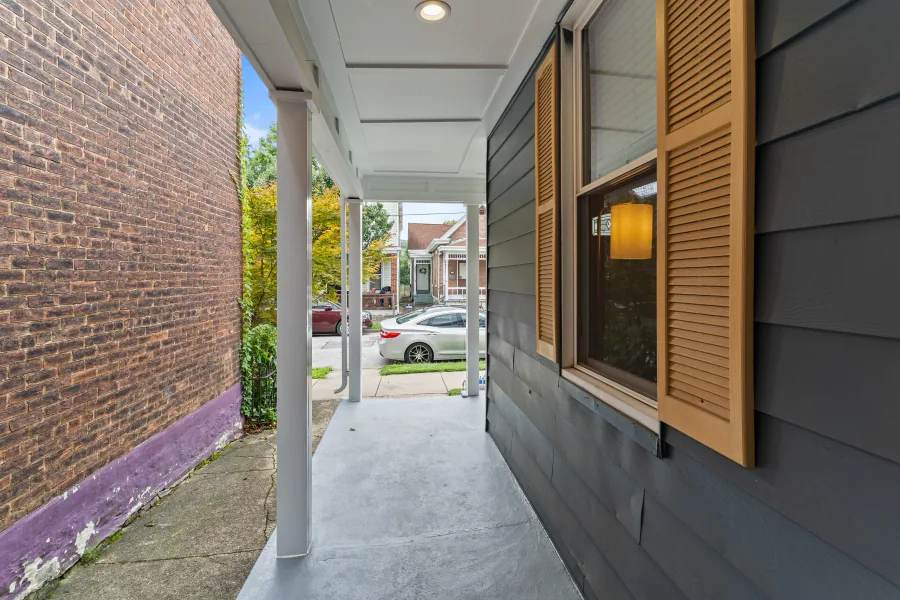 View from the front porch looking out to the tree-lined street — photographed by 513Shutter Cincinnati