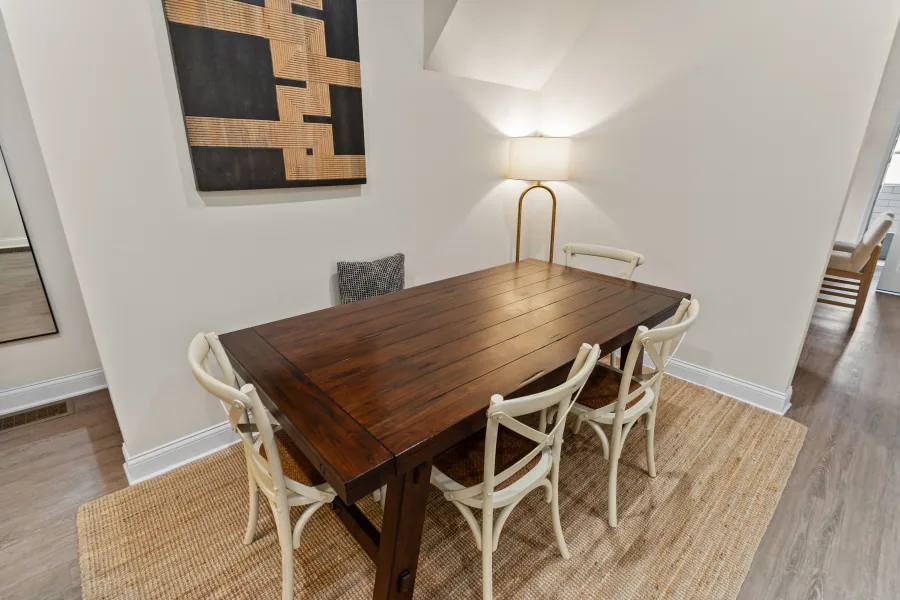Dining room with pendant lighting and open sightline to the entry — photographed by 513Shutter Cincinnati