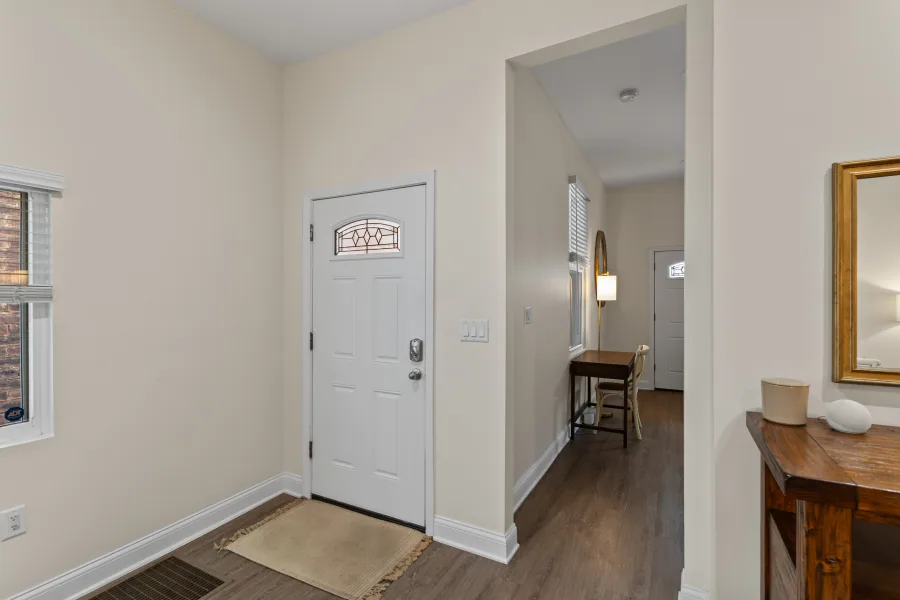 Entry hallway with hardwood floors leading toward the rear of the home — photographed by 513Shutter Cincinnati