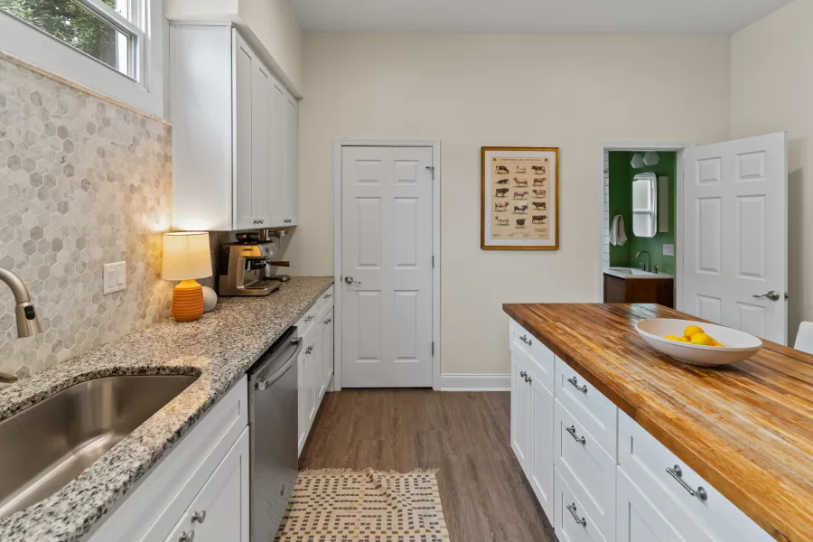 Kitchen counter run with granite surface and stainless dishwasher — photographed by 513Shutter Cincinnati