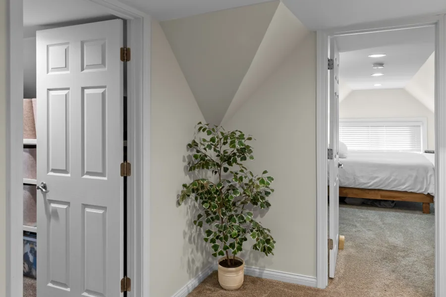 Interior door and landing with houseplant and sightline to bedroom — photographed by 513Shutter Cincinnati