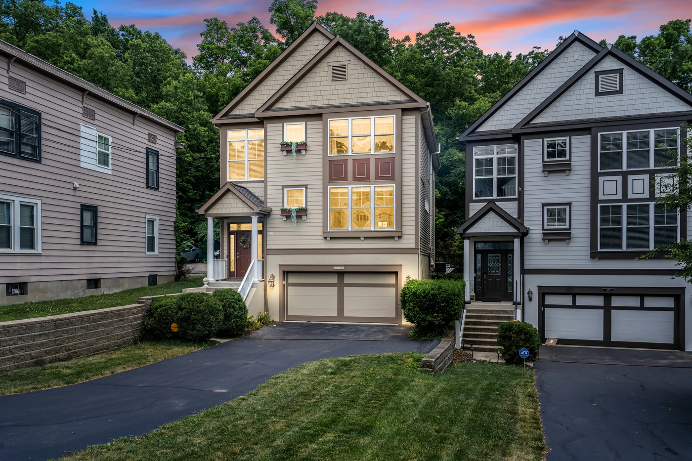 Corner-angle exterior after virtual twilight, dusk sky and warm exterior lighting
